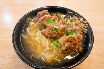 Taiwanese food of soup noodles with pork ribs cakes