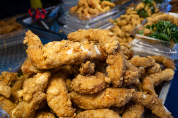 taiwanese fried chicken on a plate in the street