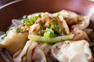 meat dumpling in chili oil