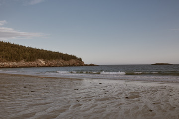 Sand beach at sunset on a cool Fall day at Acadia National Park in Mount Desert Island, Maine.