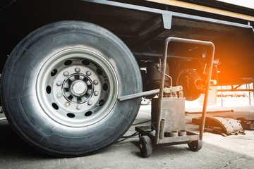 truck spare wheels ,tire waiting for to change,  trailer wheels maintenance