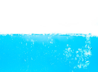 blue water waves with with bubbles on a white background