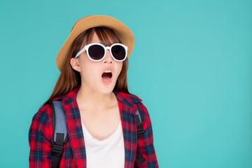 Beautiful young asian woman shouting sound loud with mouth for announce something in vacation travel with excited isolated on blue background, tourist asia girl journey in summer concept.