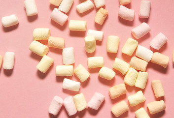 Fototapeta na wymiar Marshmallow on pink background.