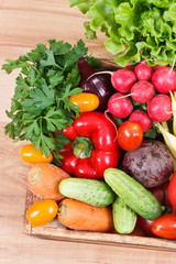 Healthy vegetables in wooden box. Source vitamins and minerals