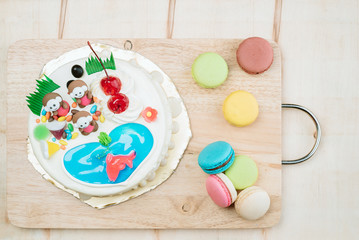 Cake on a special day for children makes children always happy and happy with sweet macarons.