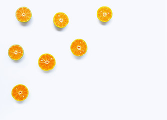 Fresh orange citrus fruit on white background.