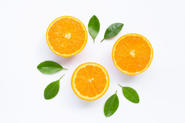 Fresh orange citrus fruit with leaves isolated on white background.