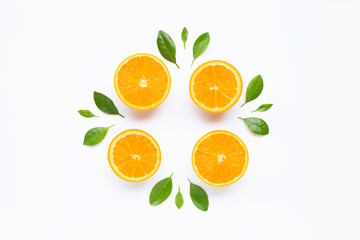 Fresh orange citrus fruit with leaves isolated on white background.
