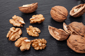 walnuts on a black slate