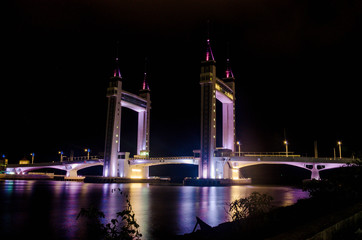 Fototapeta premium Kuala Terengganu iconic drawbridge light up at night.
