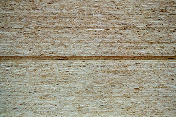 Fototapeta premium A pile of fresh wood plywood sheets. High stack of large plywood sheets