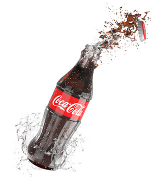 Coca-Cola bottle with splash isolated on white background Coca Cola is the most popular carbonated beverage sold worldwide