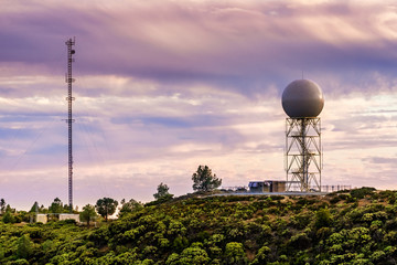 Sunset view of weather station (the Bay Area NEXRAD weather radar) close to the top of Mt Umunhum,...