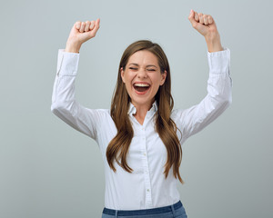Girl winner with closed eyes and raised hands.