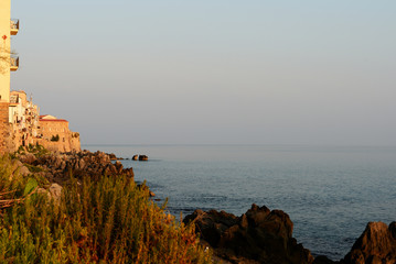 Beautiful seascape off the coast of Cefalu in the early morning. Sicily, Italy