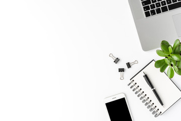 Business background with laptop and accessories. Office desktop. Top view