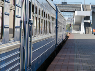 The train is at the station waiting for passengers.