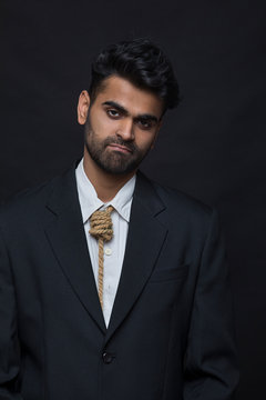young corporate executive  smiling on the outside and suffering on the inside	