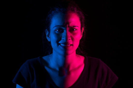 closeup of a girl in red and blue	