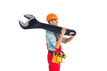 Young construction workers in hard hats on a white background