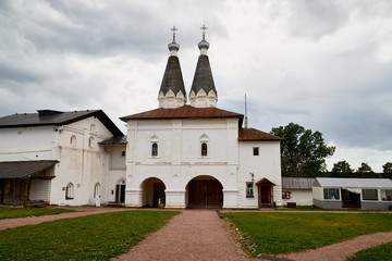 Fototapeta na wymiar Entrance in Ferapontov monastery in a summer day