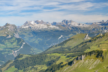 Fototapeta na wymiar Nice view on Swiss Alps as seen from top of Fronalpstock peak above the Stoos