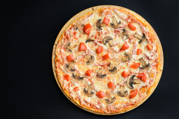 Pizza with mushrooms and ham