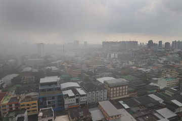 Top view of heavy rainy clouds over city of Bangkok, Thailand