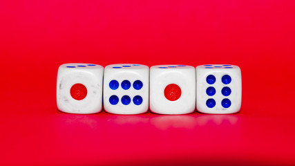 Dices with red background. Selected focus.