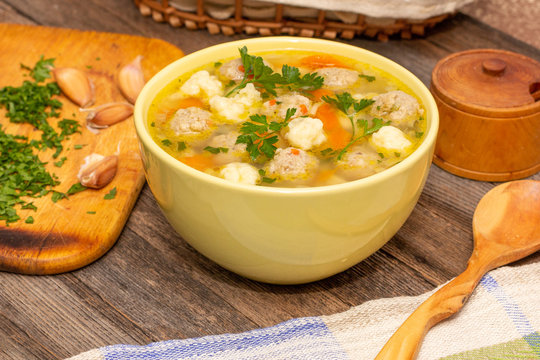 Soup With Meatballs And Dumplings Closeup