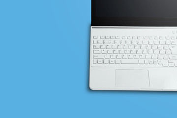 White computer on desk or table.  Copy space.  デスクまたはテーブルの上の白いパソコン  コピースペース