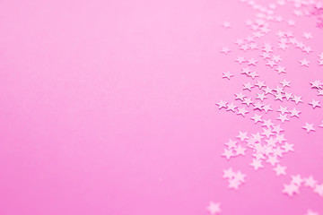 Stars on a pink background, holiday concept
