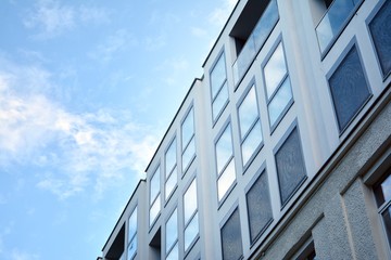 The windows of a modern building for offices. Business buildings architecture.