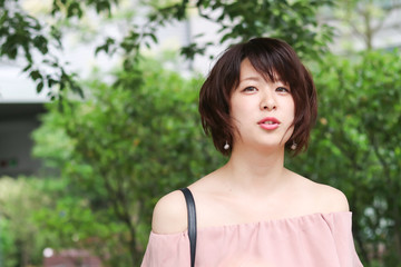 Fototapeta premium Berry cute Japanese young woman.