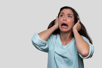 Woman screaming, suffering from mental illness, anxiety, depression, inner voices, schizophrenia,...