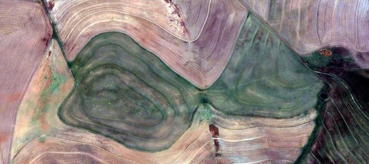the green mask, abstract photography of the deserts of Africa from the air. aerial view of desert...