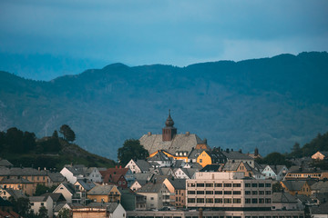 Alesund, Norway. Alesund Skyline Cityscape. Historical Center In Summer Evening. Old Aspoy School. Aspoya Island