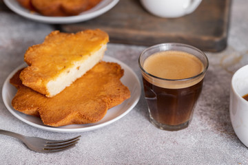 Traditional dessert from El Hierro, the Canary Island – Quesadilla with cup of coffee at local café. Canarian food background