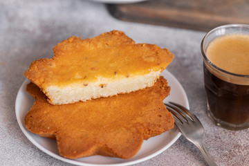 Traditional dessert from El Hierro, the Canary Island – Quesadilla with cup of coffee at local café. Canarian food background