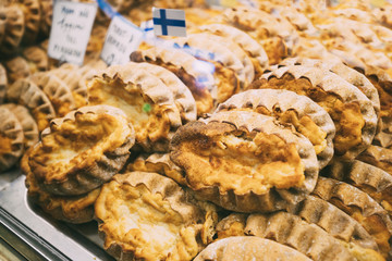 Finnish Traditional Pasties Or Pirogs - Karelian Pasties, Karelian Pies Or Karelian Pirogs From Region Of Karelia. Rustic Homemade Bread - obrazy, fototapety, plakaty