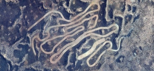 tattooing the earth, tribute to Pollock, abstract photography of the, deserts of Africa from the air,aerial view, abstract expressionism, contemporary photographic art, abstract naturalism,