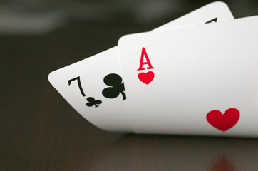 playing cards lifted up