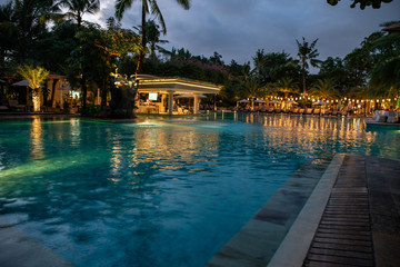Having dinner at the Restaurant pool side in Legian Bali