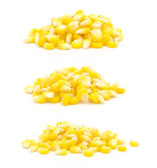 A group of fresh corn heap close-up isolated on white background