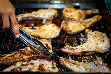 close up roasted pork steak in frying pan