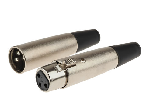 A pair of XLR connectors used in professional audio and DMX lighting, isolated on white