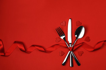 Table setting cutlery on red