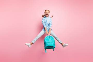 Summer. Full size photo of pretty little lady jumping high enjoy last studying day wear teal pupil backpack casual sweater clothes isolated pink color background