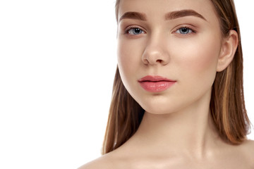 Fototapeta premium Beautiful girl with healthy perfect skin of face, nude lips.